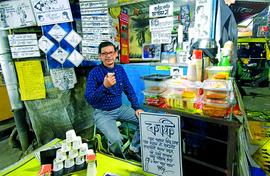 Cartoonist serves coffee with art in Kolkata kiosk